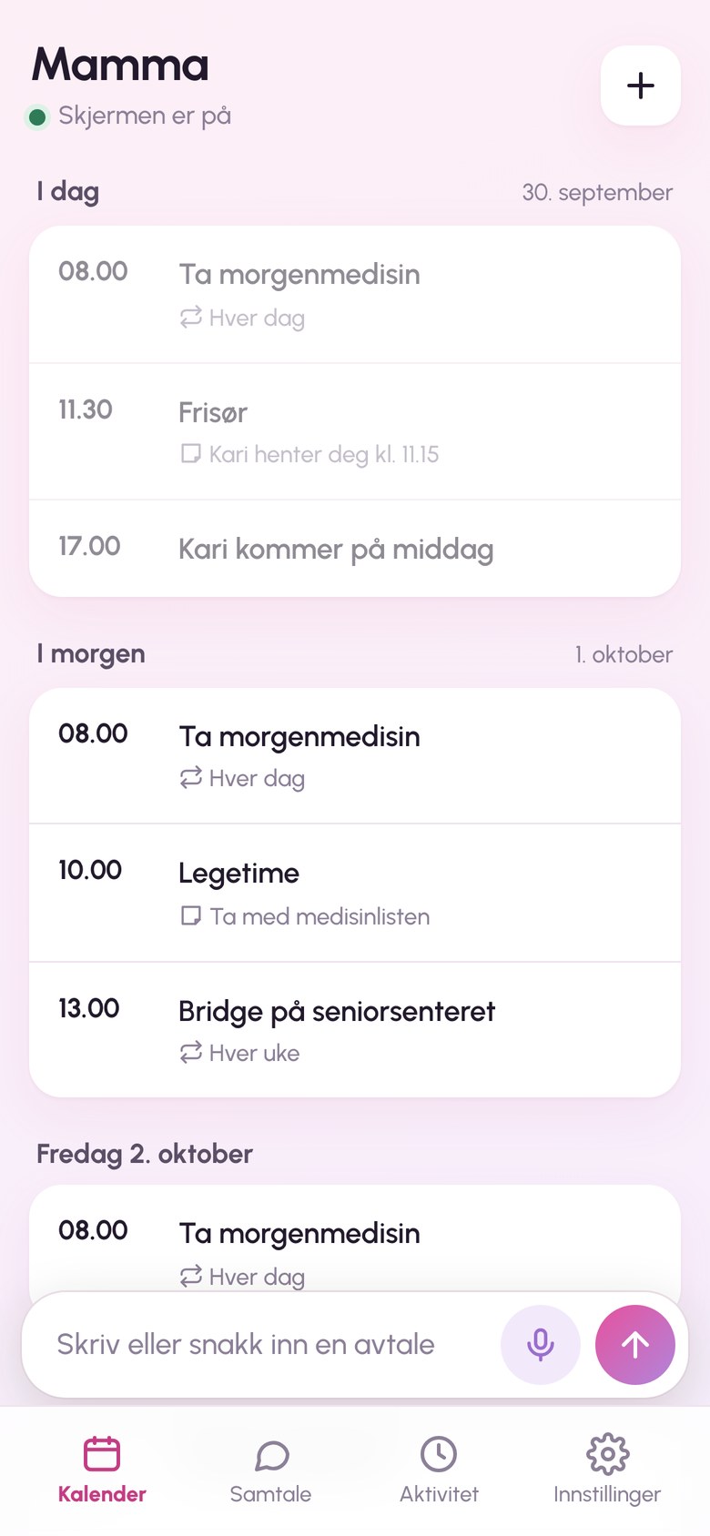 Appen på mobilen med dagens avtaler, ved siden av nettbrettet på veggen